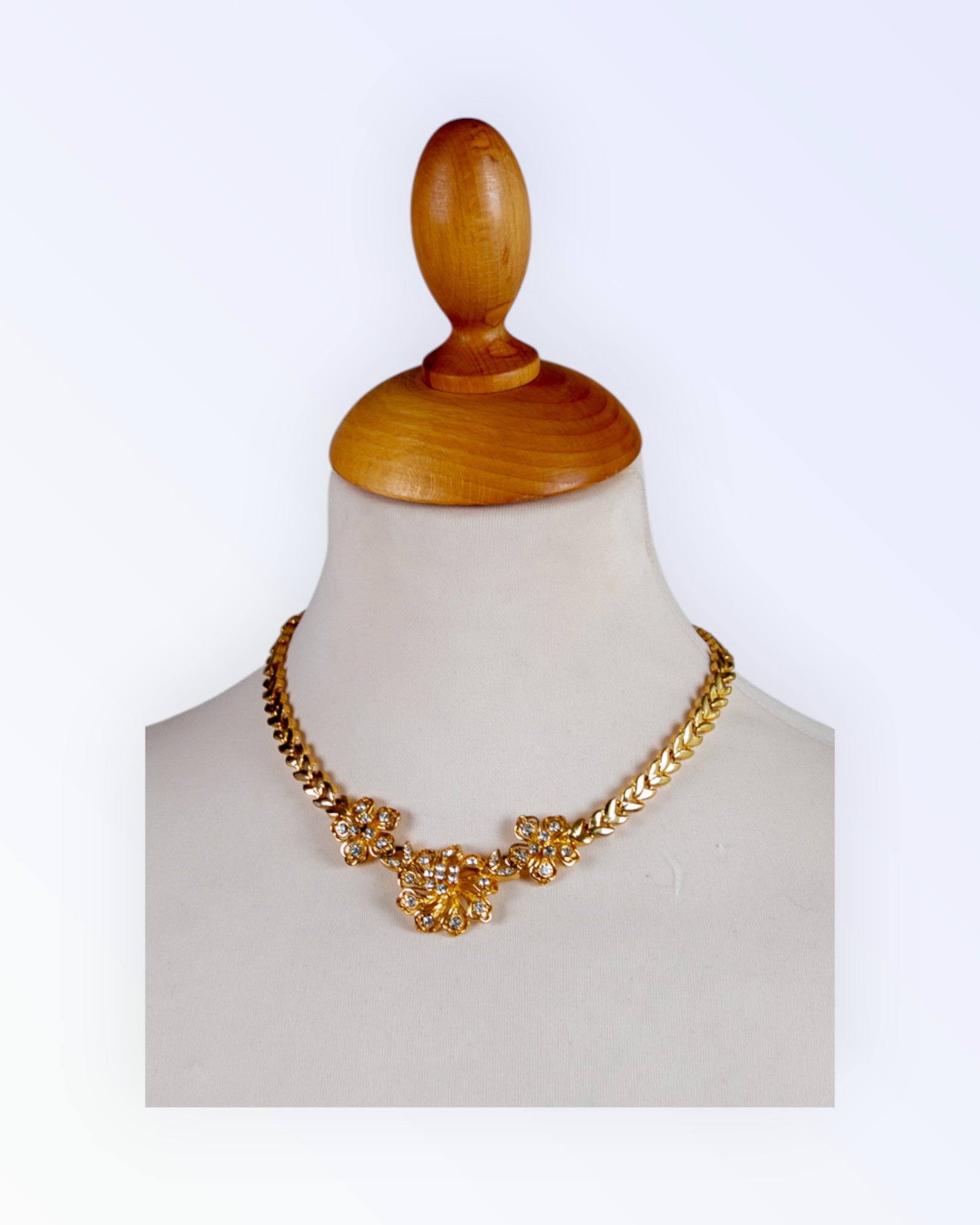 Massive gold-plated necklace with three large flowers
