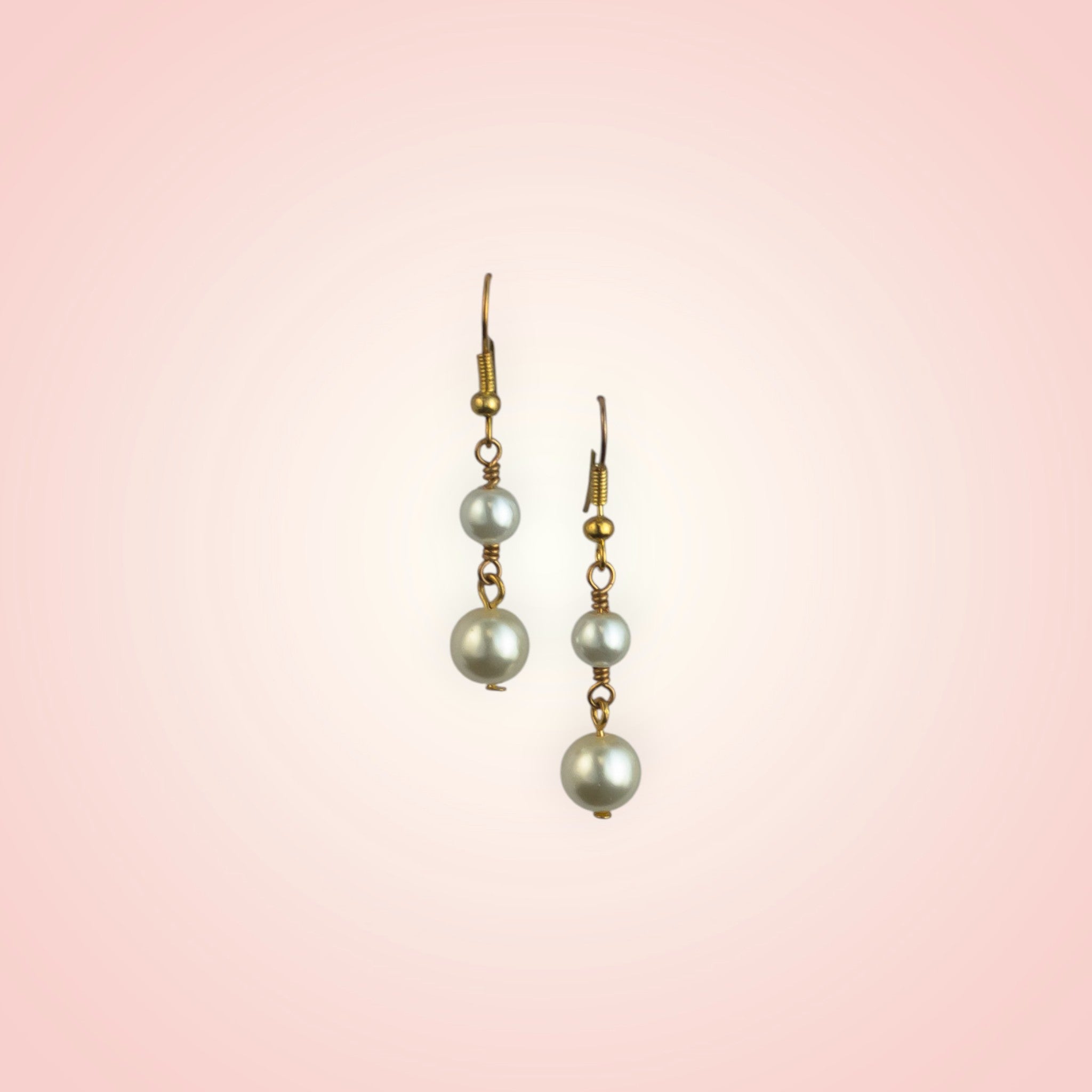 Earrings with two dangling pearls