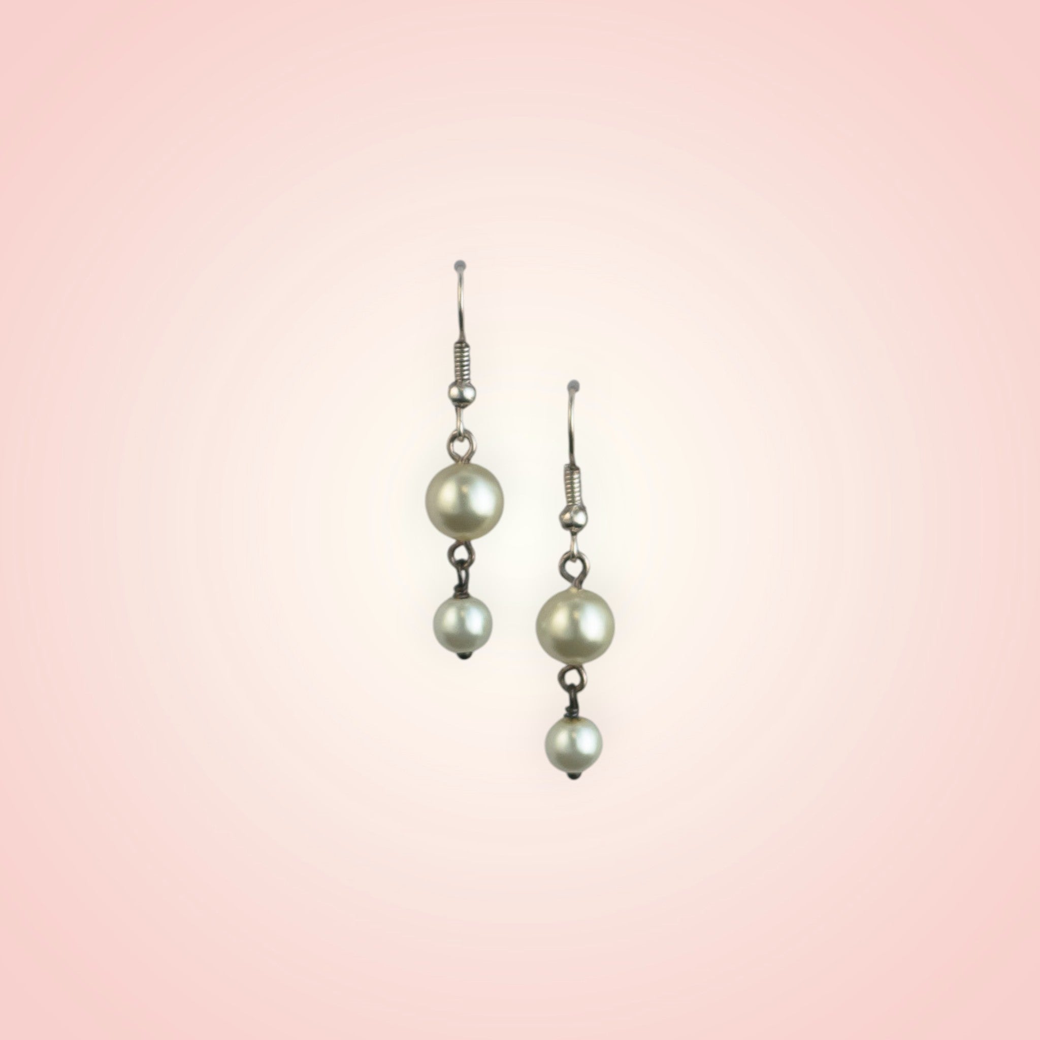Earrings with two dangling pearls