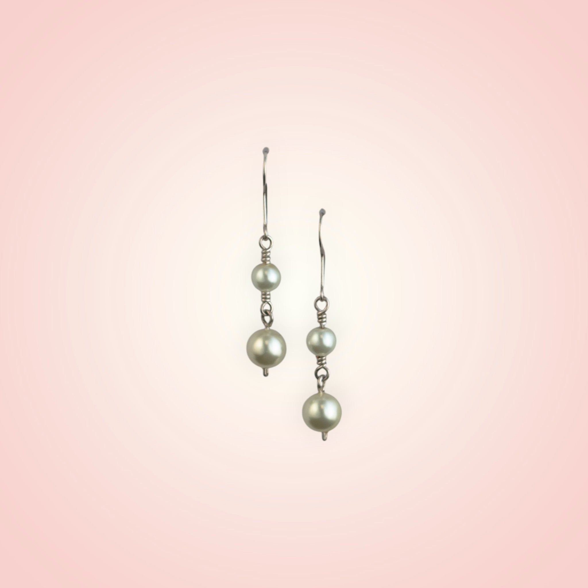 Earrings with two dangling pearls