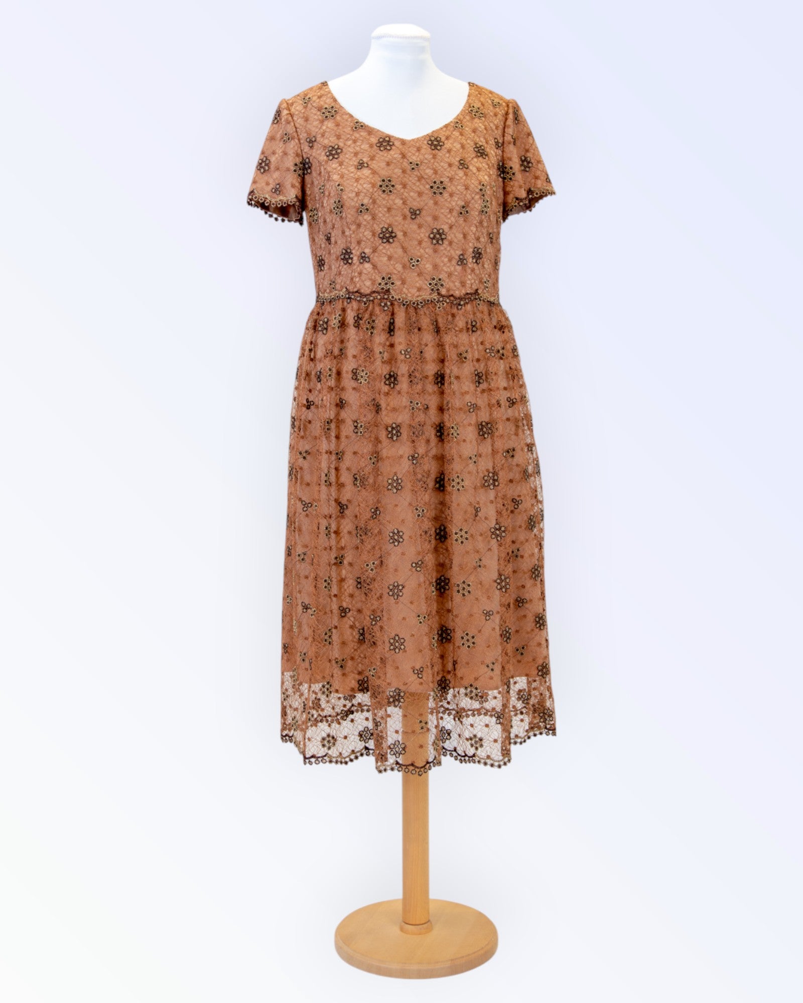 Festive dress made of brown glittering lace