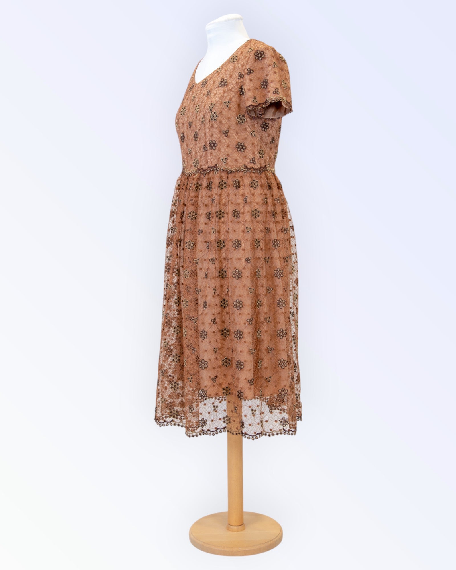 Festive dress made of brown glittering lace
