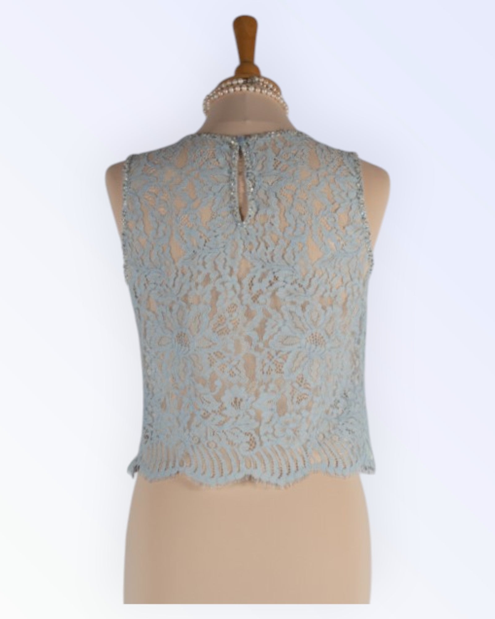 Vaaleansininen pitsitoppi