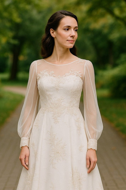Vintage-style lace wedding dress with pearl embroidery