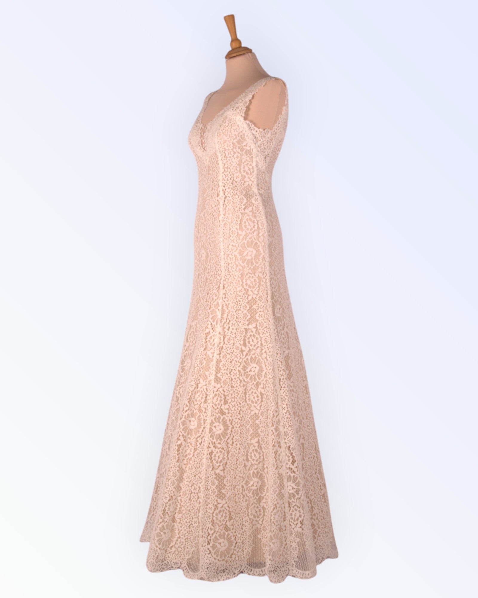 Lace dress with nude lining