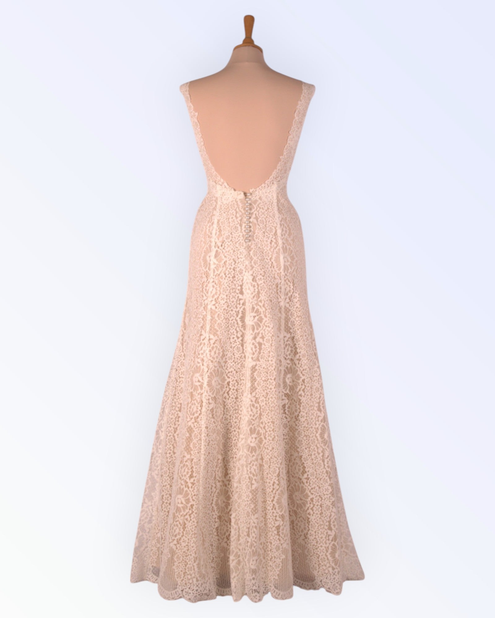 Lace dress with nude lining