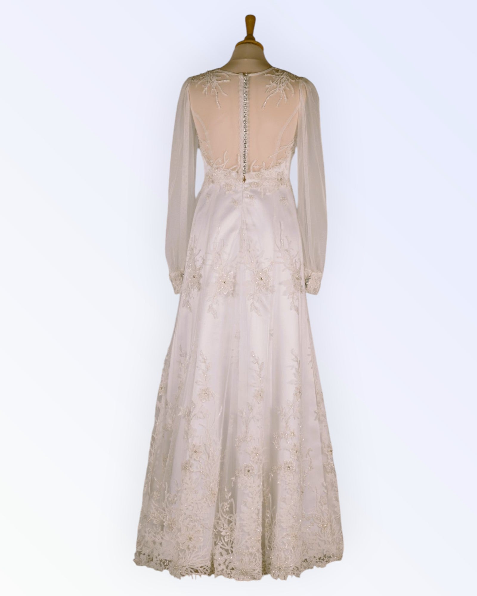 Vintage-style lace wedding dress with pearl embroidery