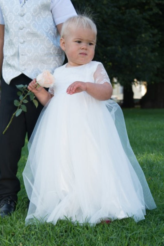 Festive dress with a fluffy tulle skirt for little girls