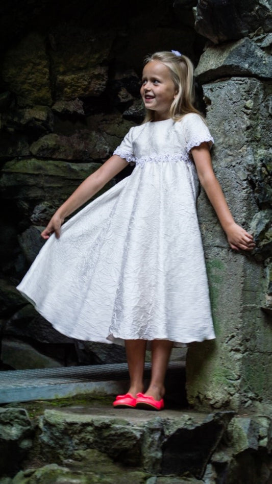 Girls' dress made of natural white raw silk
