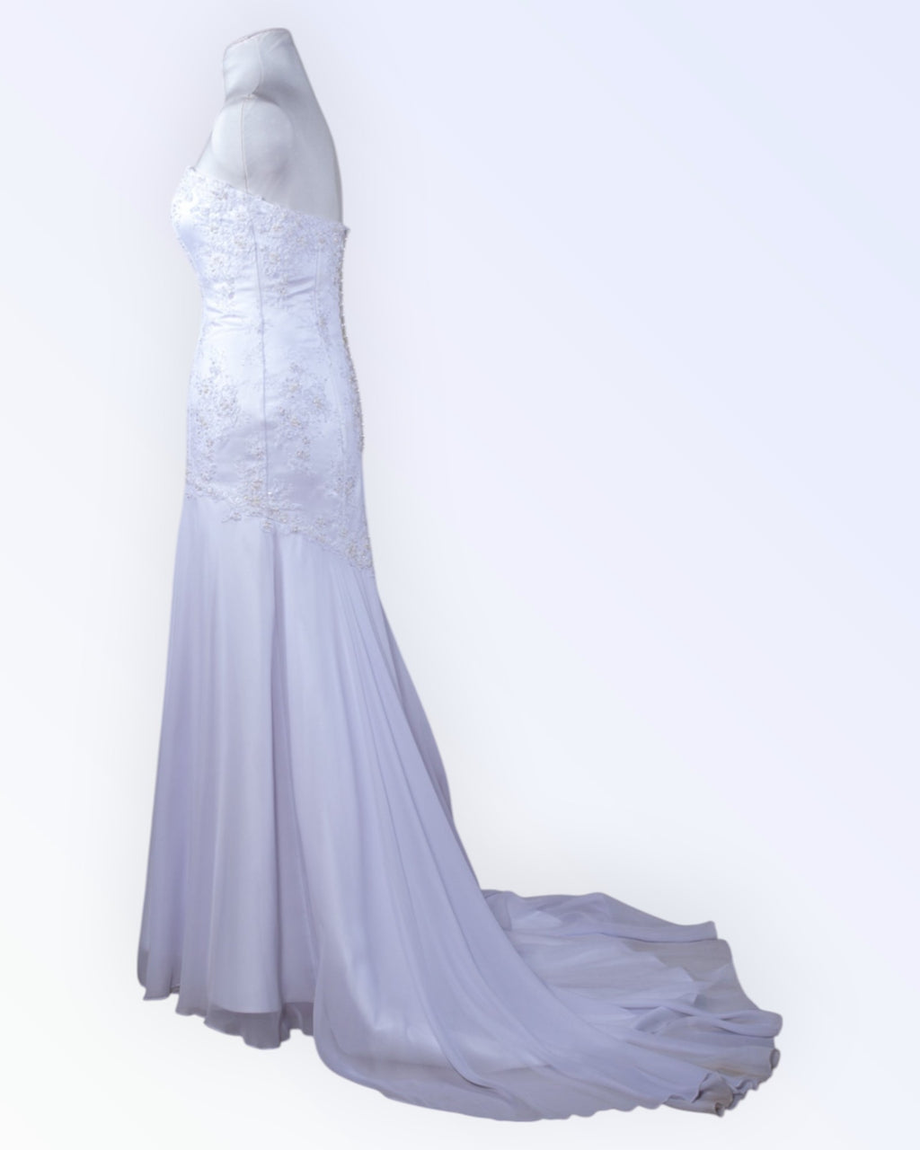 White mermaid-style wedding dress with a train