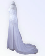White mermaid-style wedding dress with a train