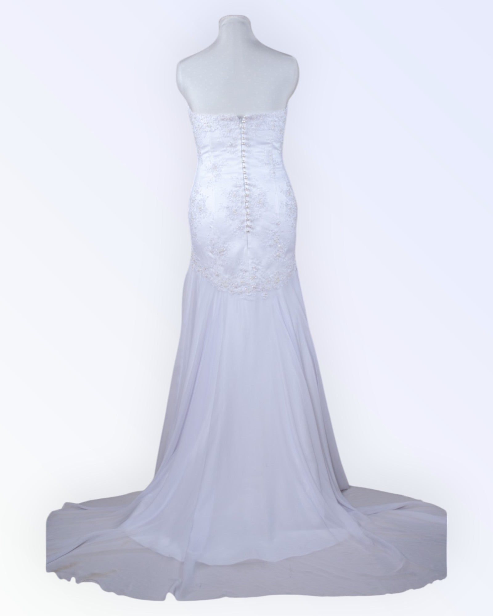 White mermaid-style wedding dress with a train