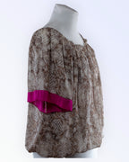 Avaralõikeline šifoontop