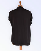 Soaked in Luxury black loose-fitting summer blouse