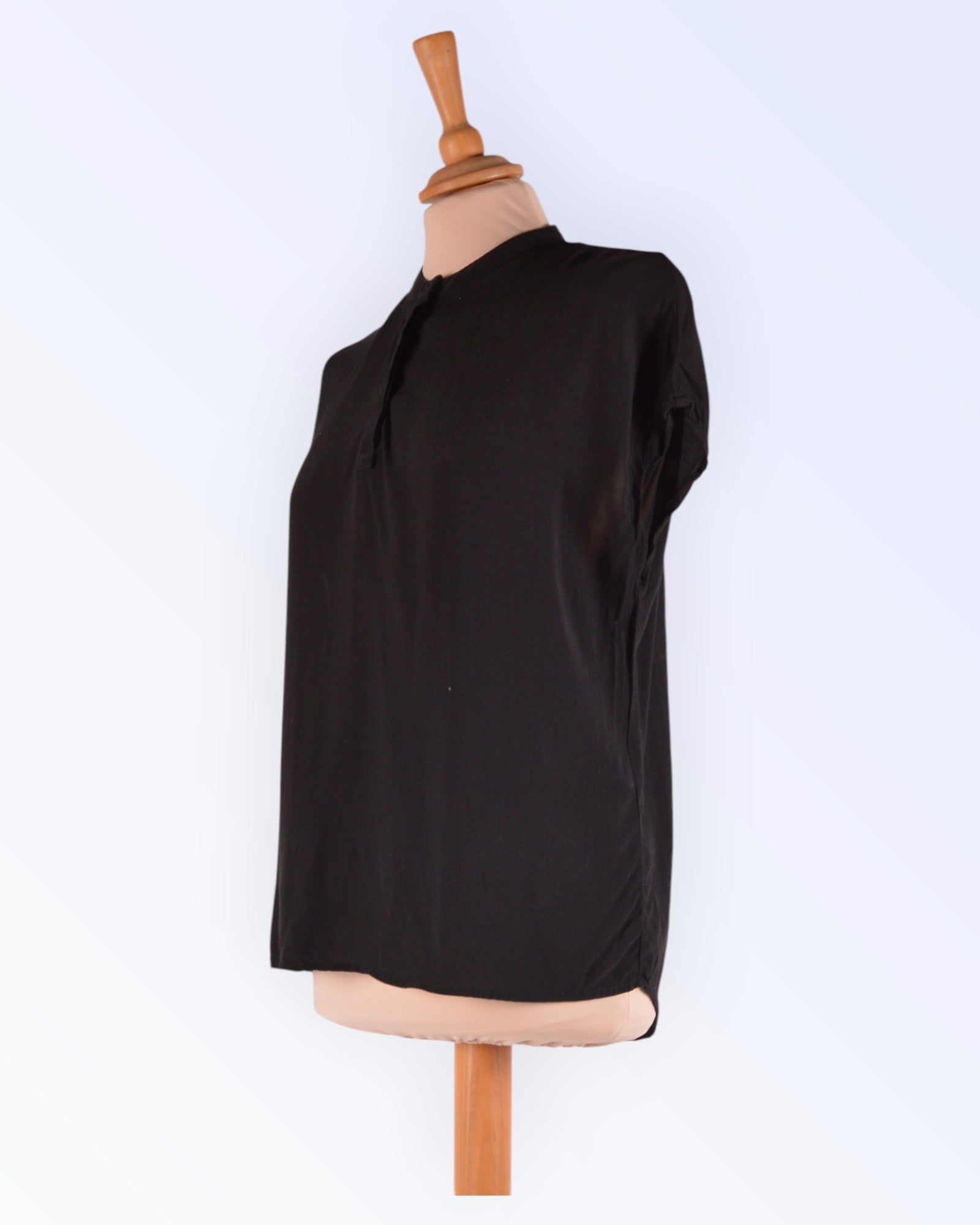 Soaked in Luxury black loose-fitting summer blouse
