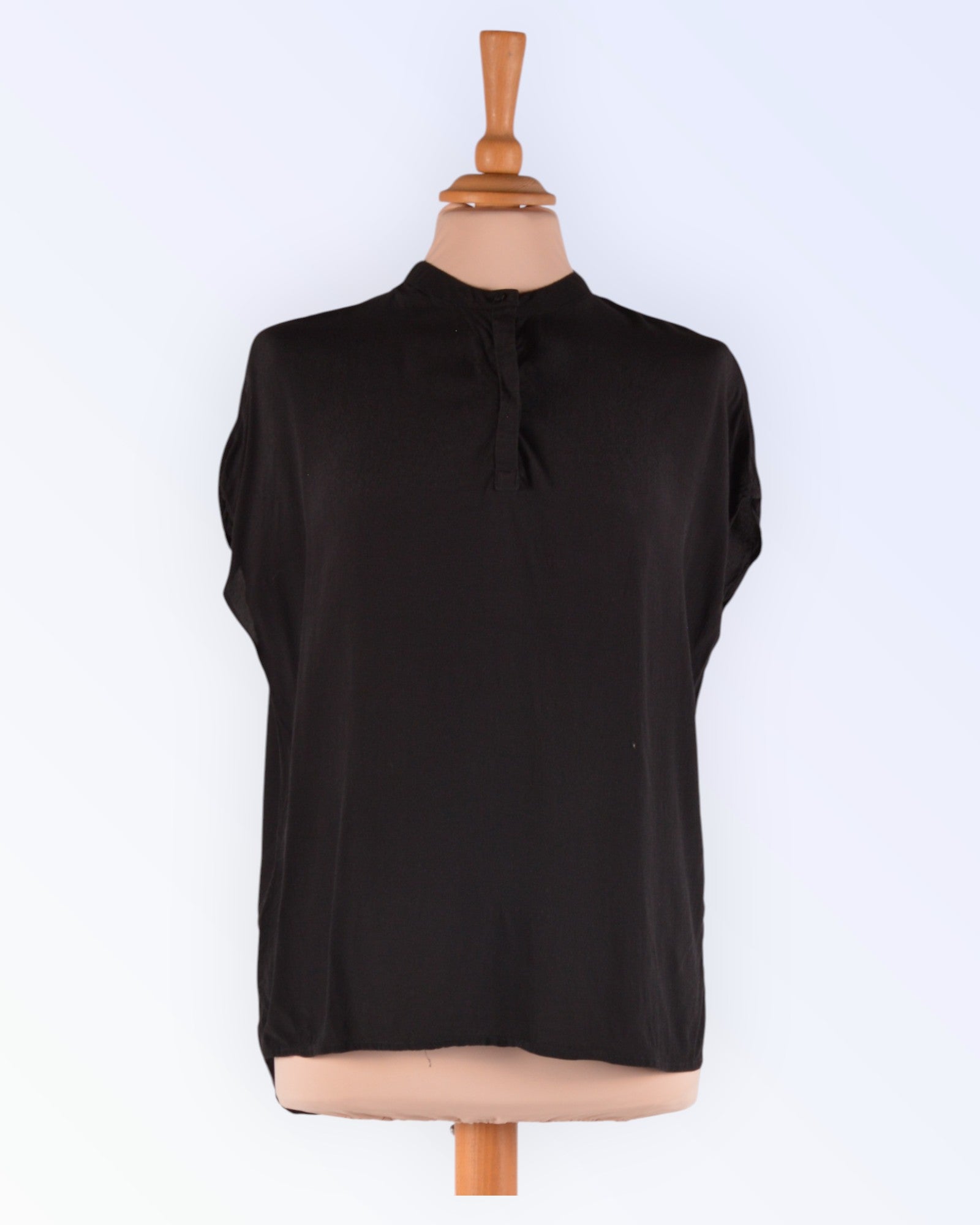 Soaked in Luxury black loose-fitting summer blouse