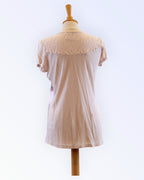 Cream colored knit top