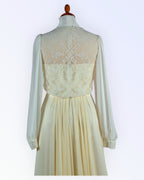 Off-white lace jacket for the bride