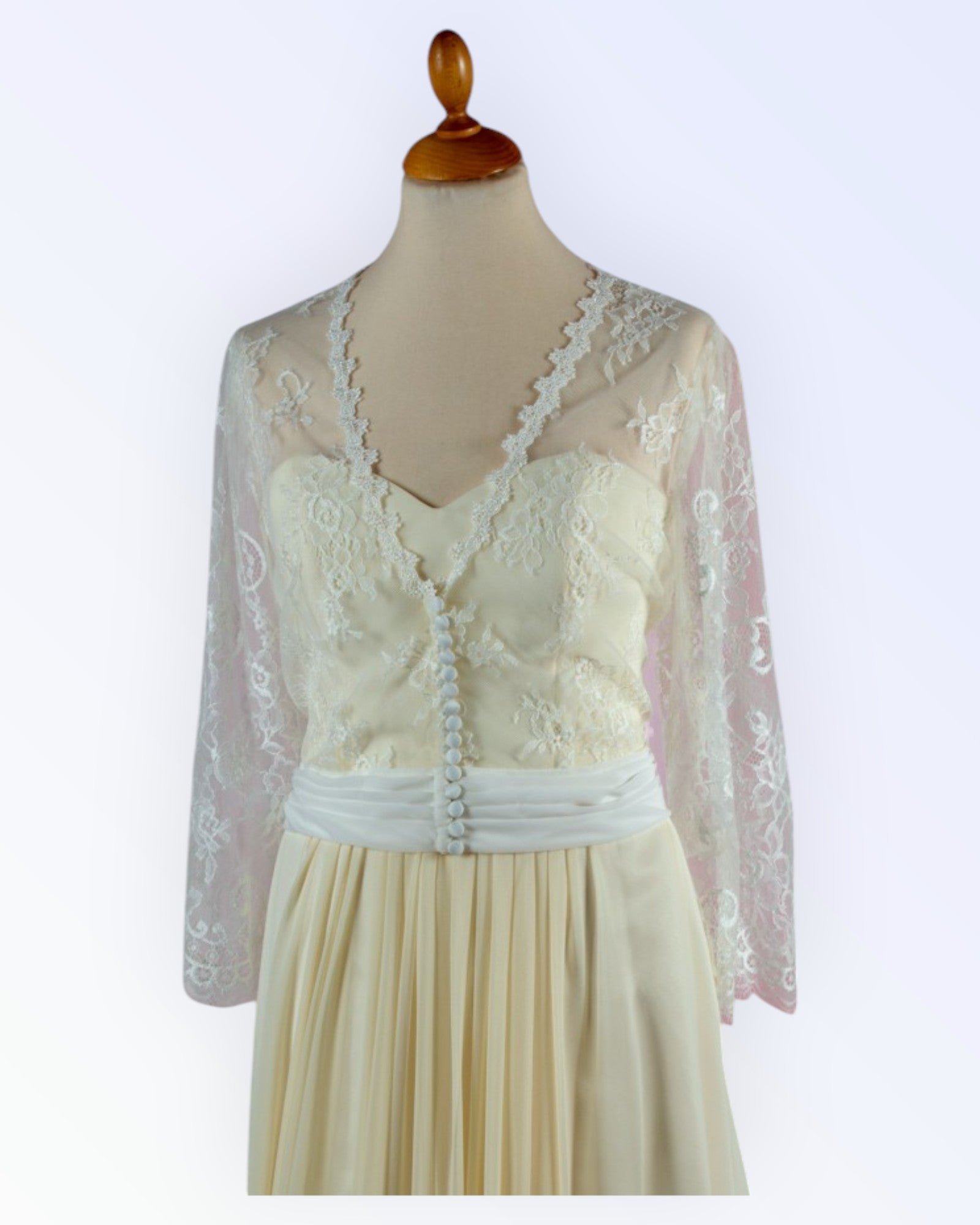 Off-white lace jacket for the bride