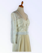 Off-white lace jacket for the bride