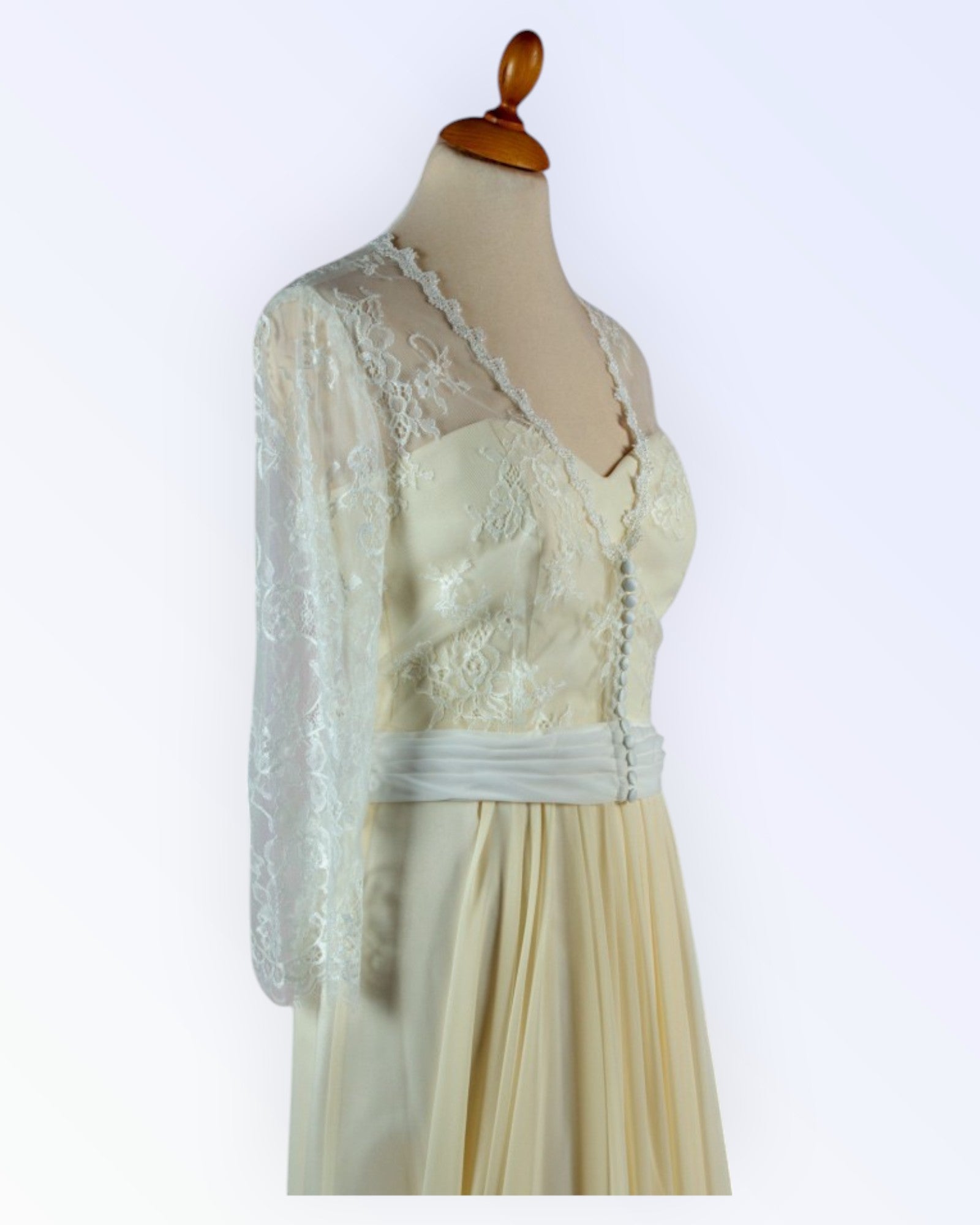 Off-white lace jacket for the bride