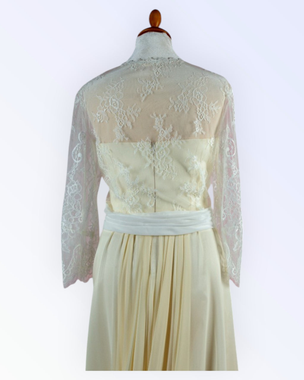 Off-white lace jacket for the bride