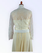 Off-white lace jacket for the bride