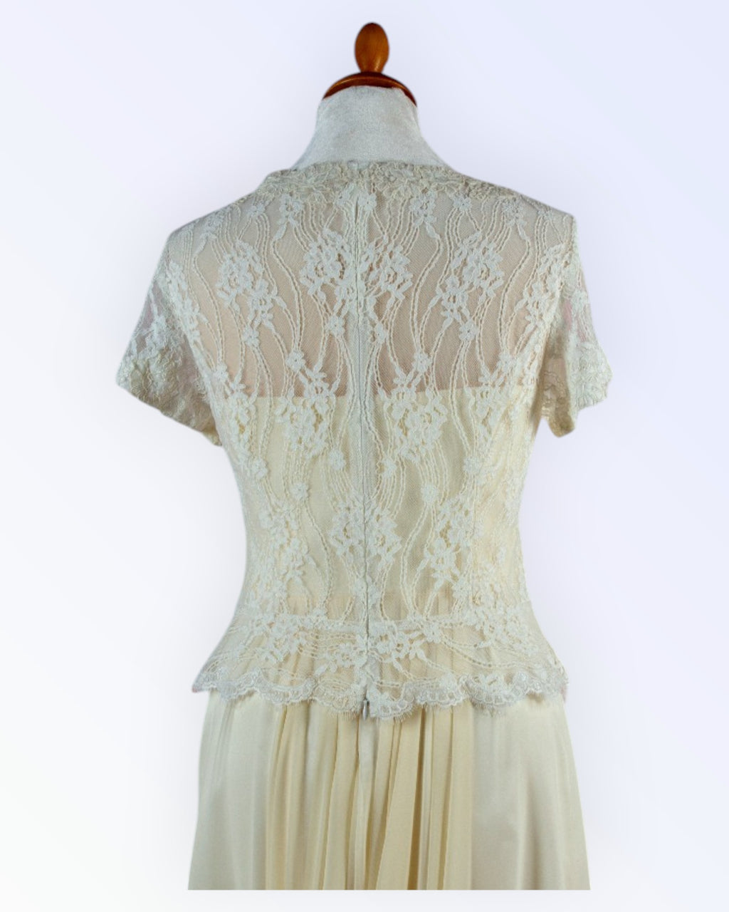 Off-white lace top with peplum