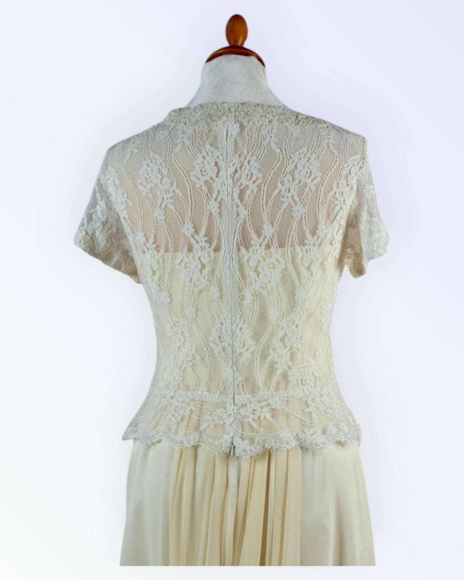 Off-white lace top with peplum