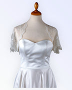 Festive off-white lace bolero