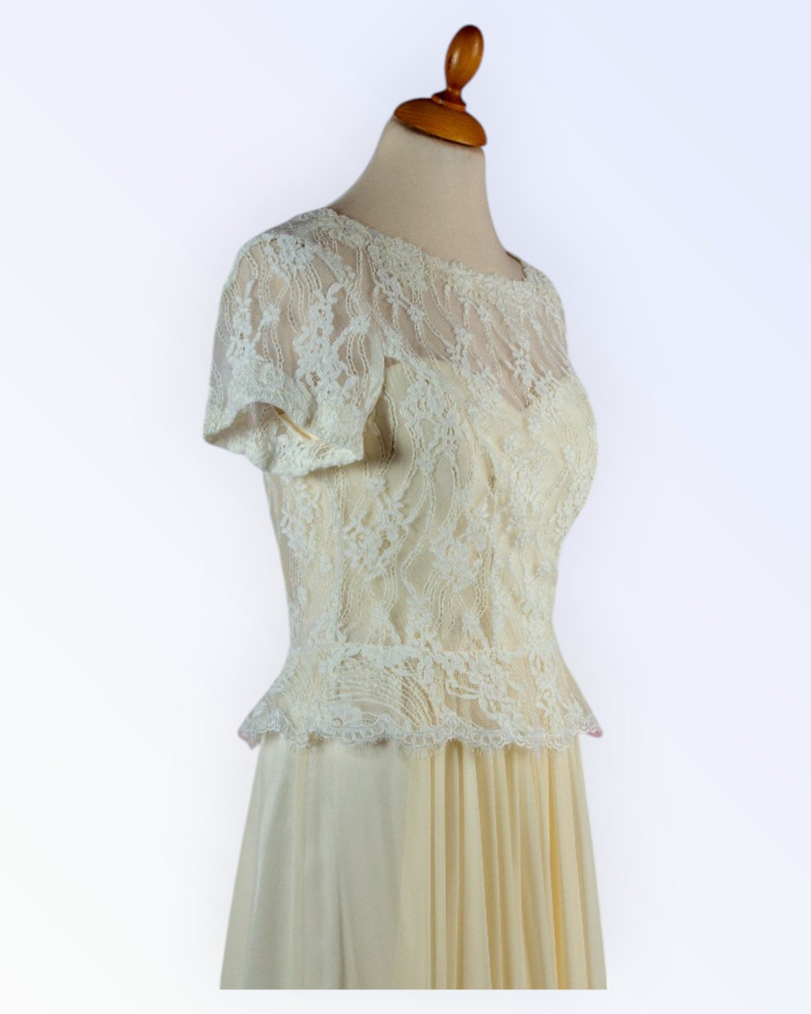 Off-white lace top with peplum