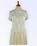 Off-white lace top with peplum