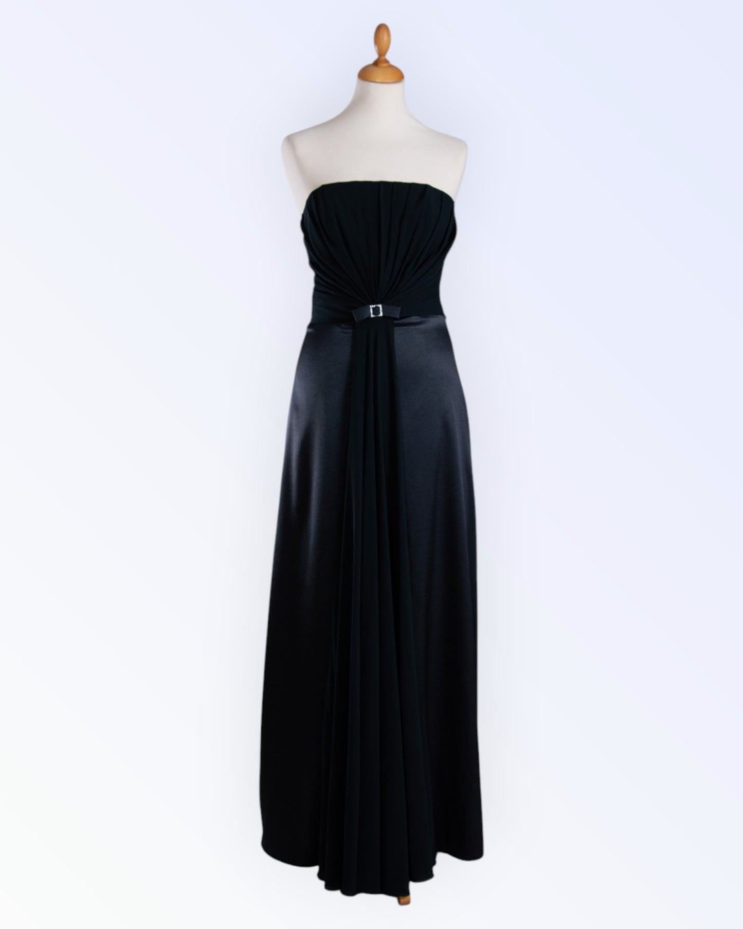 Black dress with chiffon details and a glittering buckle