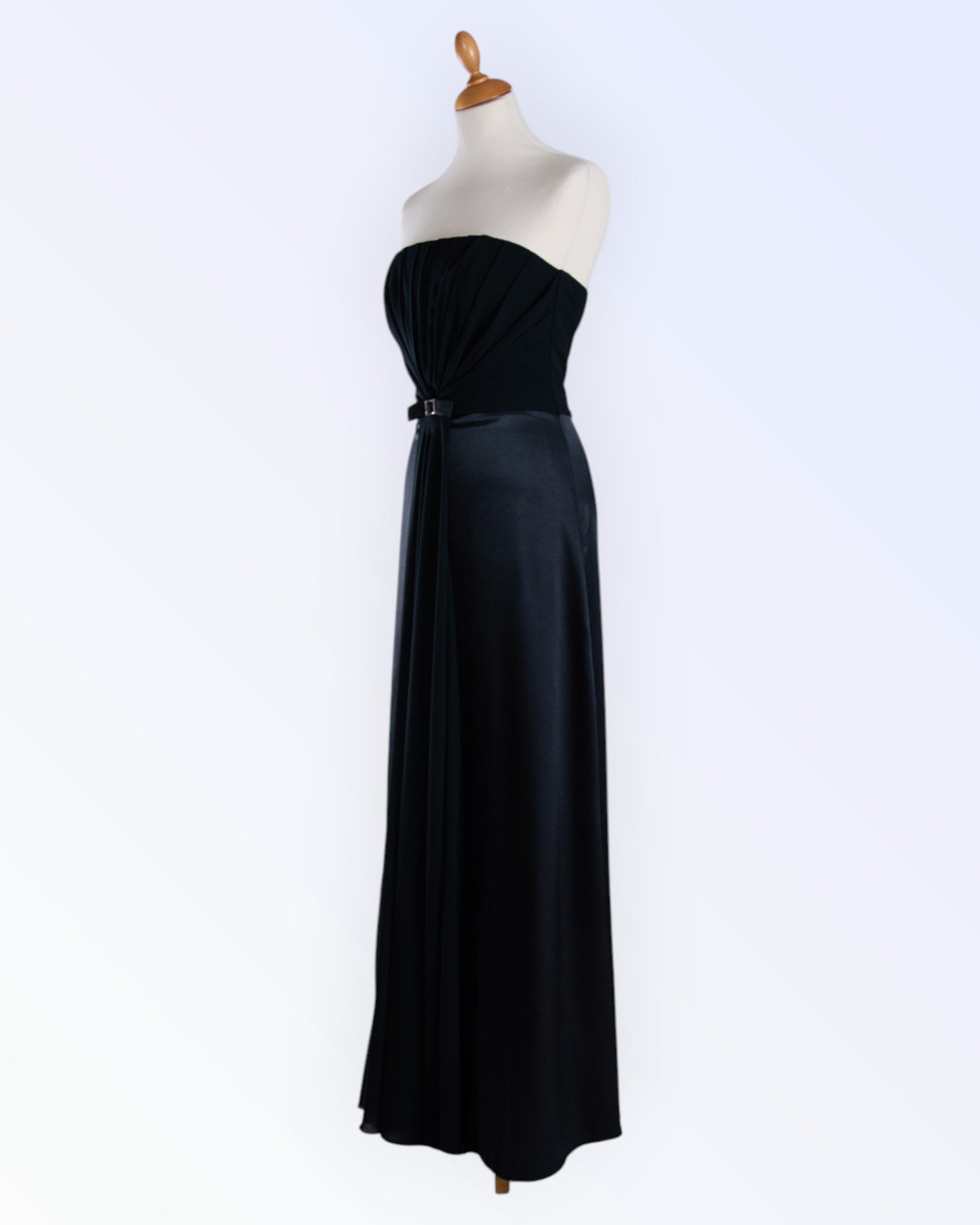 Black dress with chiffon details and a glittering buckle