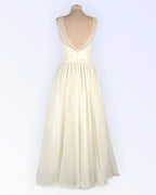 Off-white wedding dress with chiffon skirt