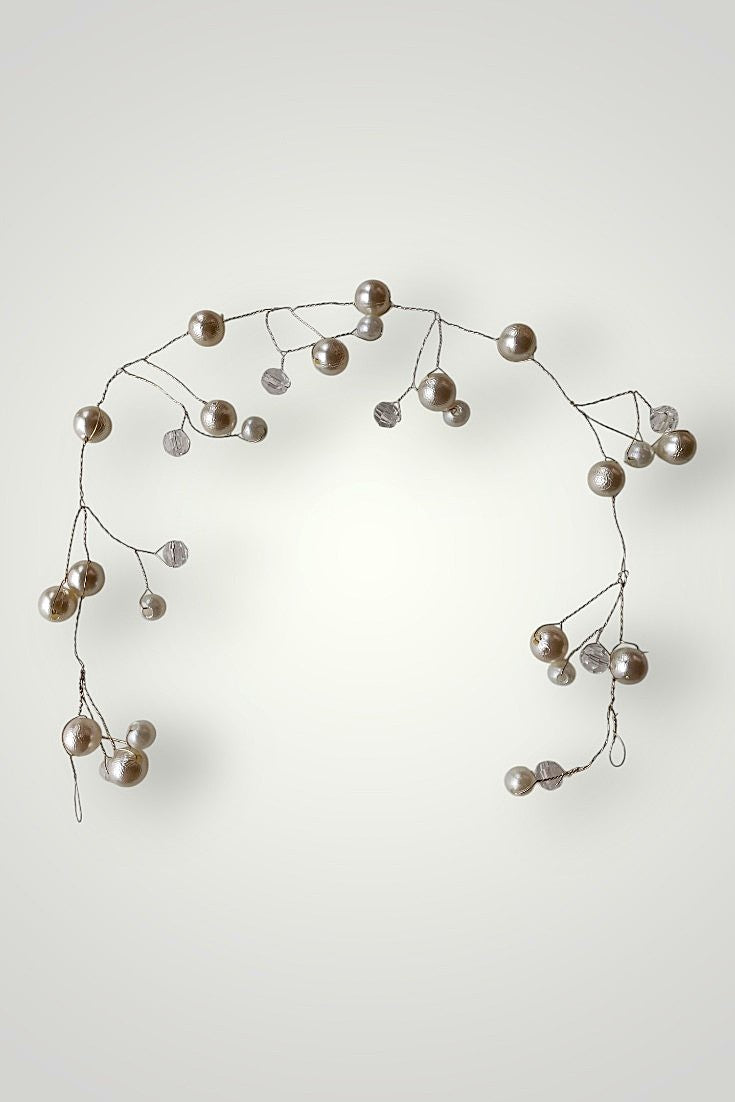 Juustesse põimitav soengukaunistus