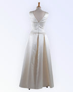 Wedding dress with pleated skirt