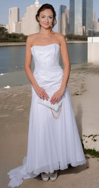 White mermaid-style wedding dress with a train