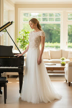 Romantic wedding dress with tulle skirt