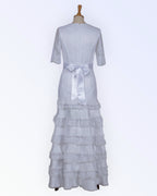 Wedding dress with ruffled skirt