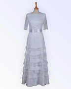 Wedding dress with ruffled skirt