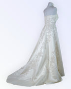 Off-white wedding dress with train