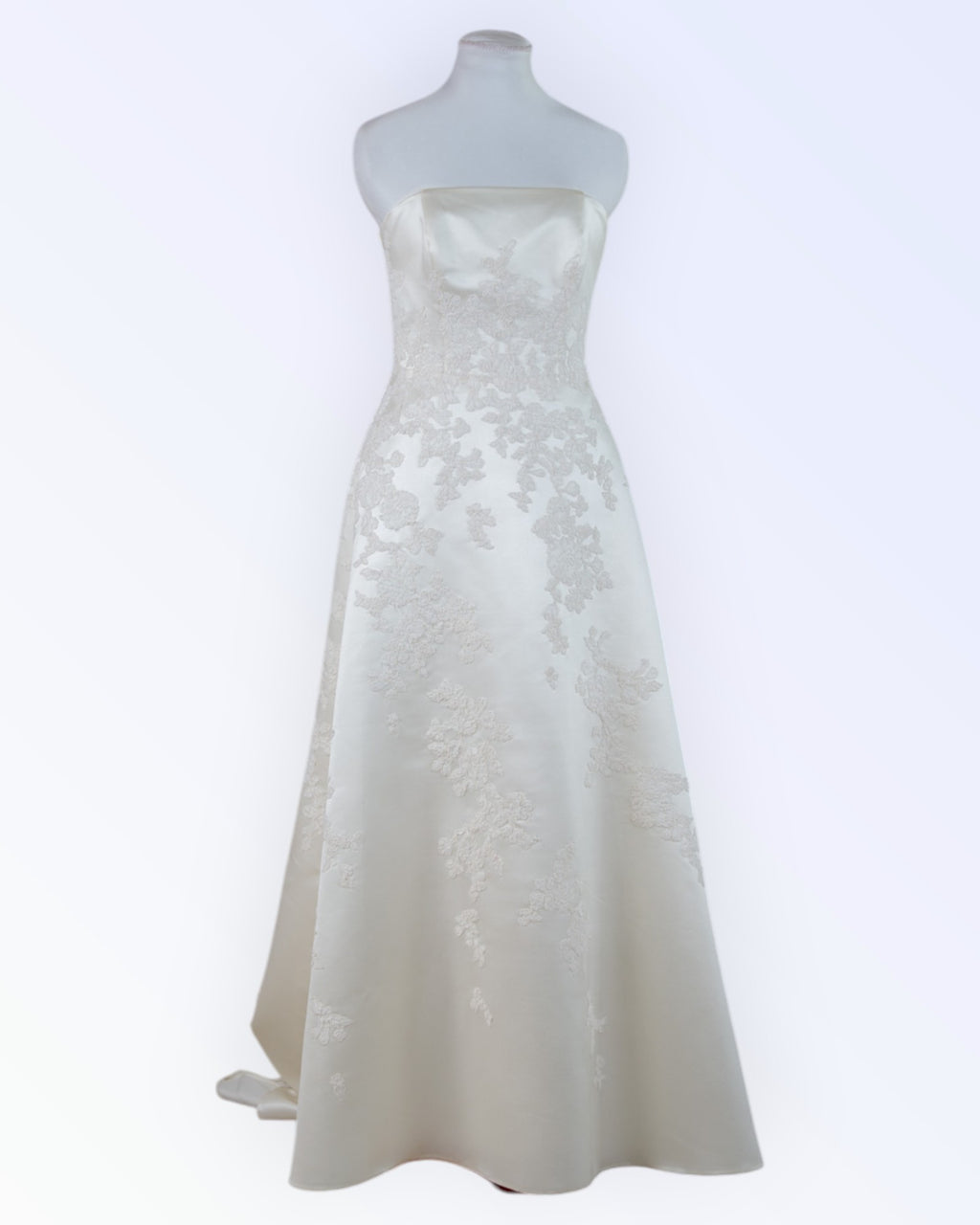 Off-white wedding dress with train