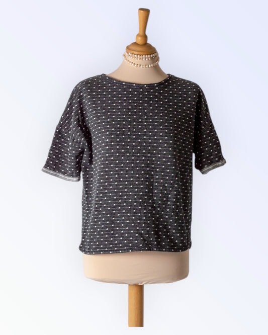 Next pilkullinen toppi